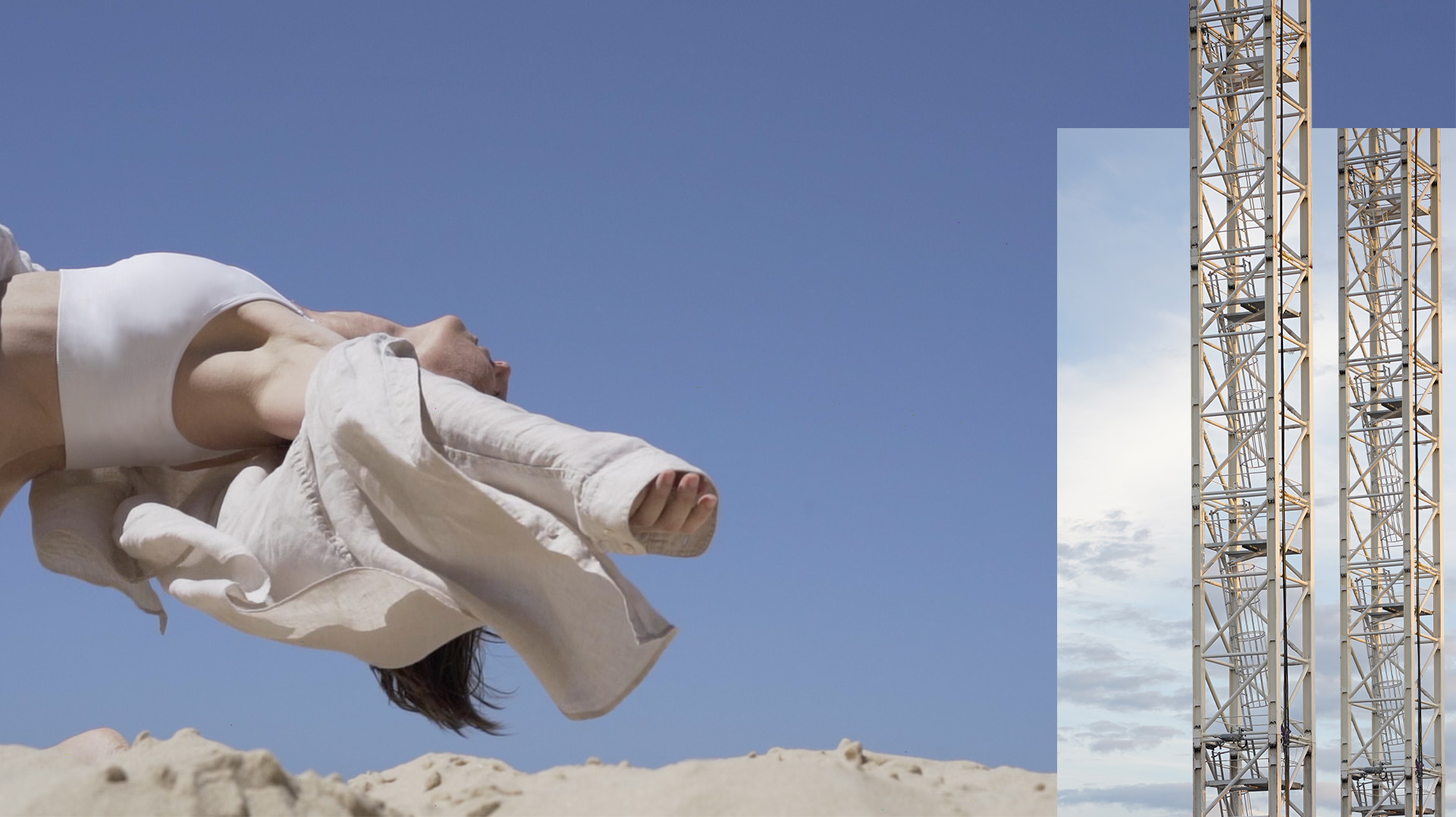 A still image taken from an artist film. It depicts a female, floating on her back just above the sand. There is an inset image of two tall metal towers.